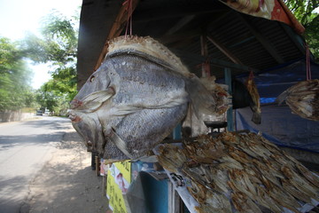 asian food stand on a street - dried fish