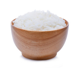 rice in wooden bowl on white background