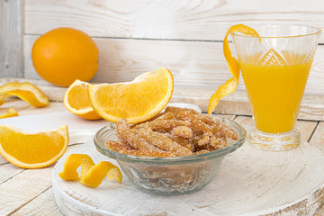 Homemade candied orange peels in glass bowl