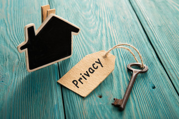 privacy concept - vintage key with tag with inscription