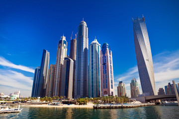 Fototapeta na wymiar Dubai marina with luxury yachts in UAE