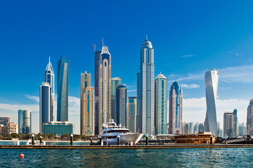 Fototapeta na wymiar Dubai marina with luxury yachts in UAE