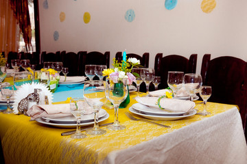 Table setting in restaurant interior. Birthday celebration