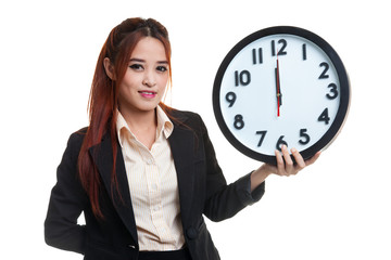 Young Asian business woman with a clock.