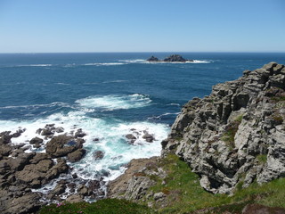 Fototapeta na wymiar View of rugged coastline at Cape Cornwall,England on a sunny day in late Springtime