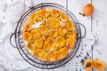 Pie with apricots.Homemade cakes,with lavender on a white background.