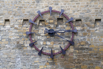 Old clock on the old wall