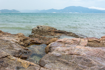 Rocky seashore and islands in Shenzhen bay, China.