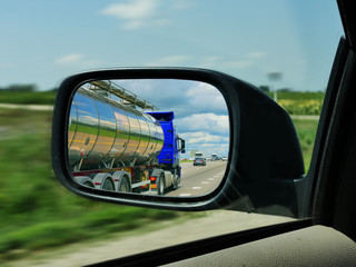 Truck in the rearview mirror.