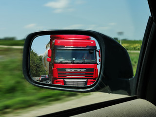 Truck in the rearview mirror.