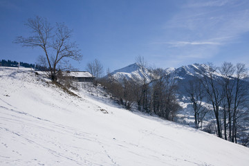 Landscape of Gstaad in Switzerland, with snow in winter