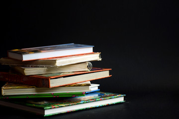 Books on pile/
Bunch of books and scripts 