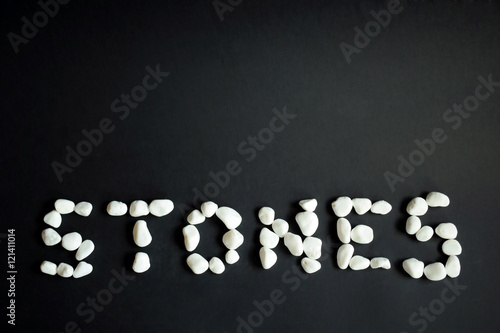 “Stones word made of stones/Word stones written with white stones on