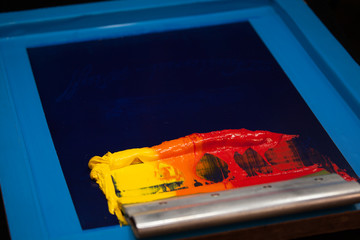 Fototapeta premium hot tone of colour silk screen printing made color grading by hand followed by step of colour toning. start from yellow to orange and red.