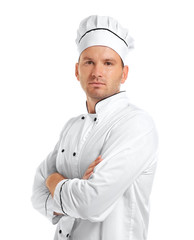 Young chef cook with crossed arms isolated on white