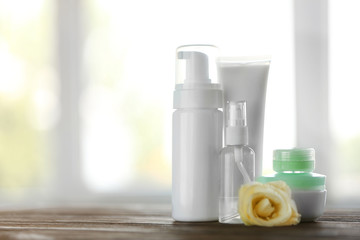 Cosmetics set on light background