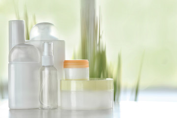 Cosmetics set on light background