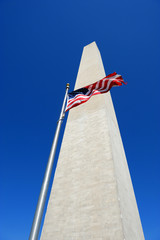 Washington monument and waving USA flag