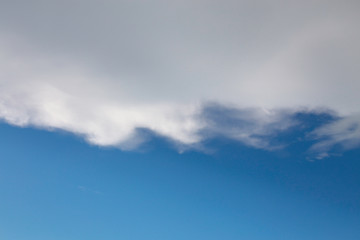 Naklejka na ściany i meble Cloud blue sky