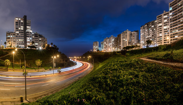 Panoramic night view of the Armendaris downhill and highway in MIraflores, Lima, Peru.