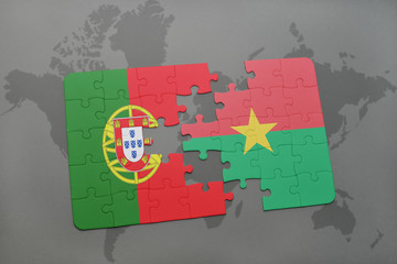 puzzle with the national flag of portugal and burkina faso on a world map background.