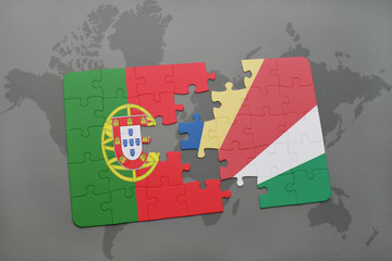puzzle with the national flag of portugal and seychelles on a world map background.