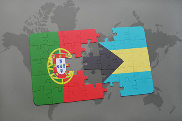 puzzle with the national flag of portugal and bahamas on a world map background.