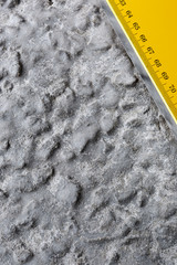 The measuring tool on the surface of reinforced concrete foundat