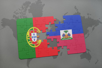 puzzle with the national flag of portugal and haiti on a world map background.