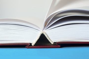 Open book on light table. Back to school. Copy space
