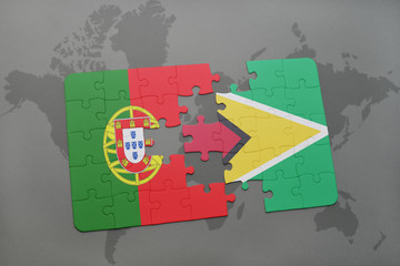 puzzle with the national flag of portugal and guyana on a world map background.