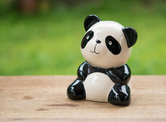 Panda bear on wooden table