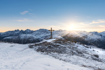 Winter sunset over Alps Mountains ridge