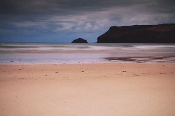 Early morning view of the beach at Polzeath Vintage Retro Filter