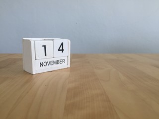 November 14th. November 14 white wooden calendar on vintage wood