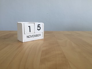 November 15th. November 15 white wooden calendar on vintage wood