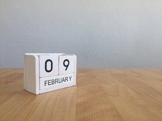 February 9th.February 9 white wooden calendar on vintage wood ab