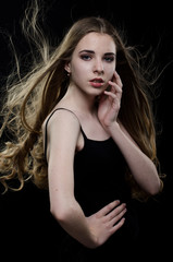 Fototapeta premium girl playing with hair