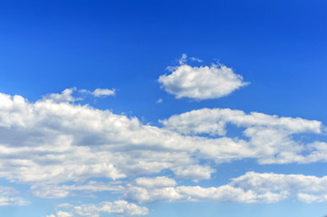 Naklejka na ściany i meble Blue cloudy sky background