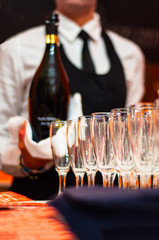 Bartender serving champagne