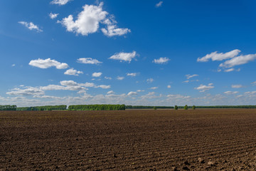 field tillage agriculture sky