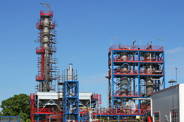 refinery construction site with workers
