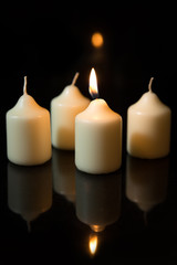 First sunday in advent, candles with black background