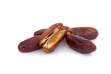 Sweet and healthy dates isolated on white background.