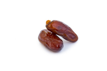 Sweet and healthy dates isolated on white background.