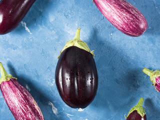 Eggplants on blue background