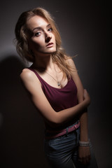 Beautiful blonde on a black background.