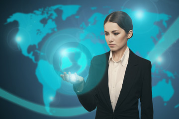 Attractive businesswoman touching icon of media earth