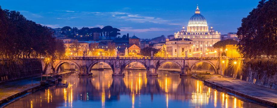 Fototapeta Vatican City, Rome, Italy, Beautiful Vibrant Night image Panorama of St. Peter's Basilica, Ponte Sant Angelo and Tiber River at Dusk in Summer. Reflection of The Papal Basilica of St. Peter