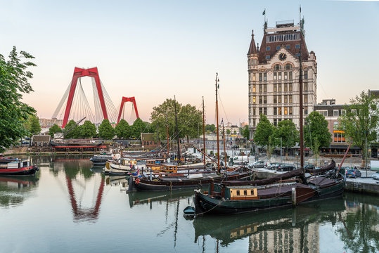 Rotterdam City, Oude Haven oldest part of the harbour, historic ship yard dock, Old Ship, Openlucht Binnenvaart Museum, Haringvliet and the Willemsbrug bridge at Dusk in Summer, Netherlands